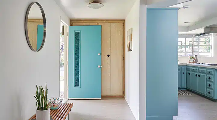 A kitchen with a sink and a window