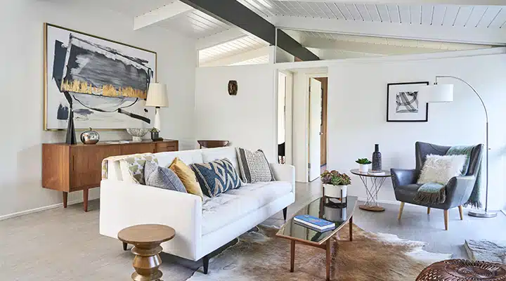 A living room filled with furniture and a fireplace