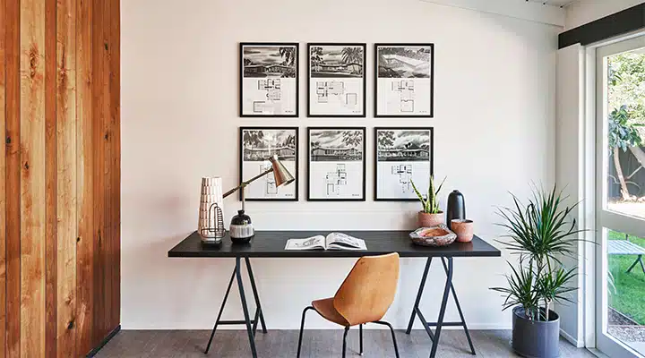 A dining room table in front of a window