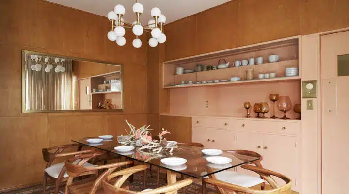 A kitchen with a dining room table