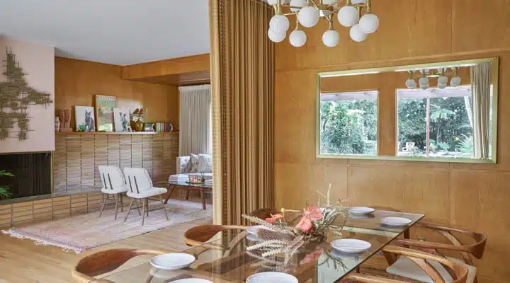 A dining room table in front of a window