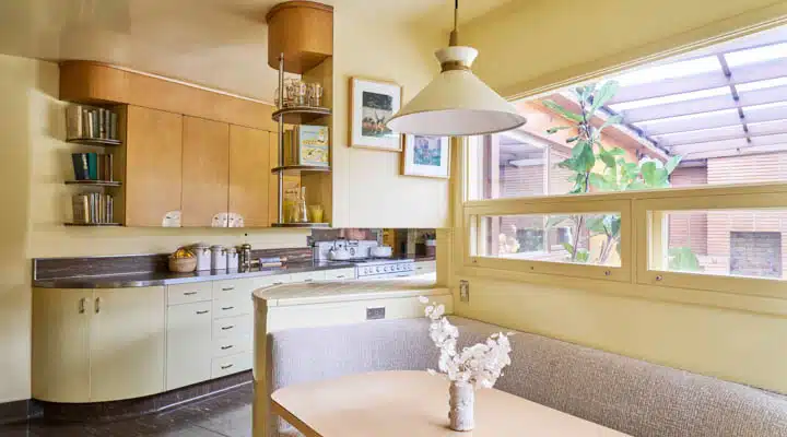 A kitchen with a sink and a window