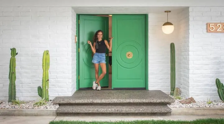 A person standing in front of a building