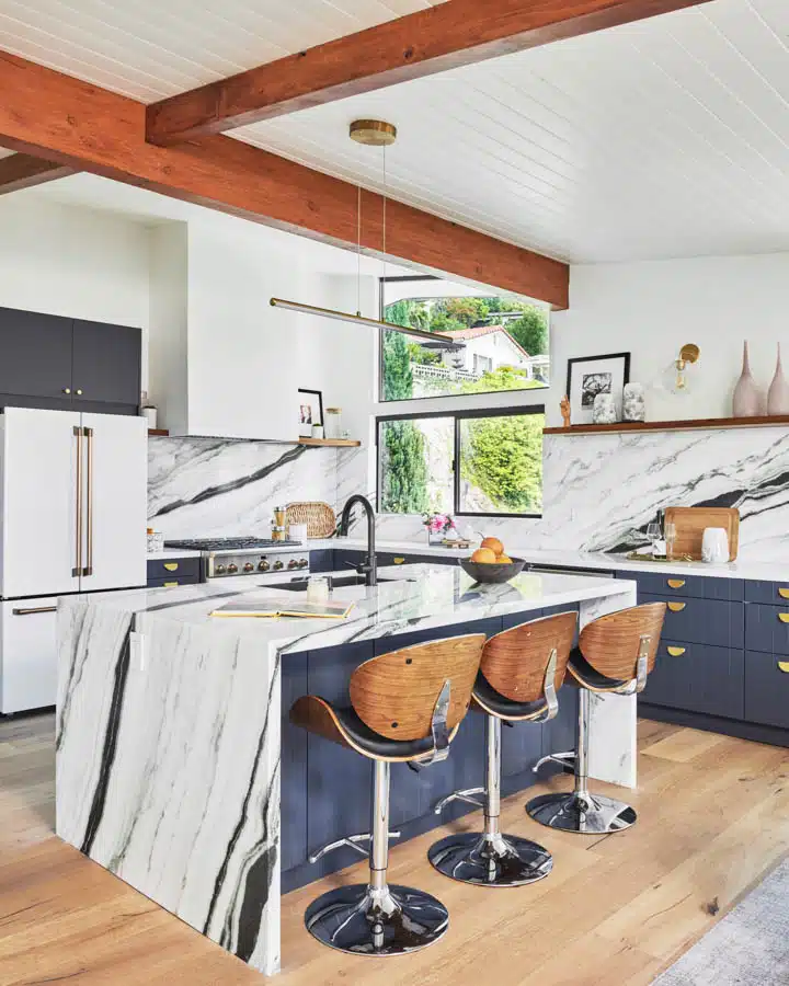 A kitchen with a wooden floor