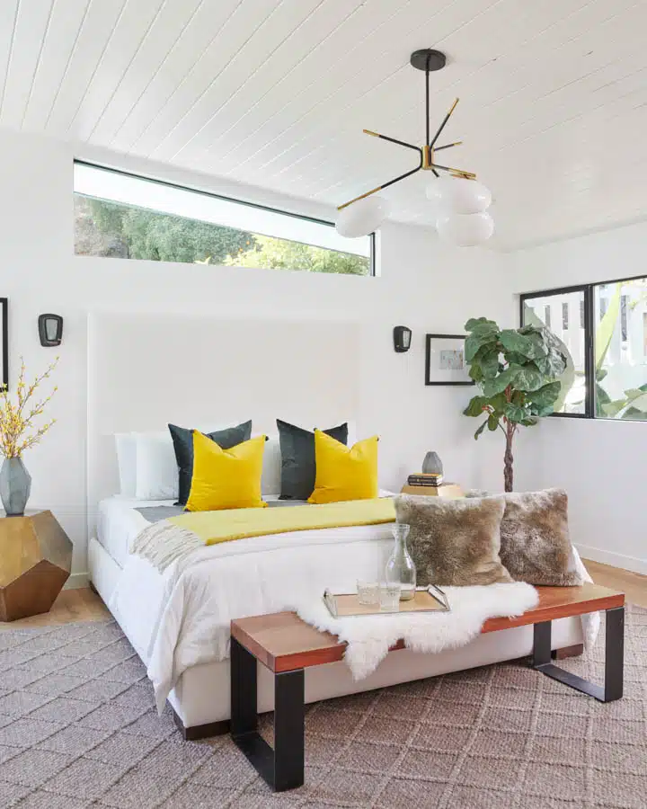 A living room filled with furniture and a large window