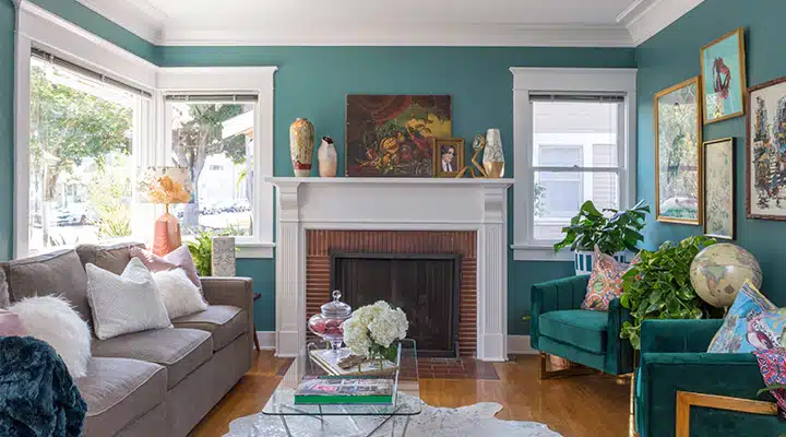 A living room filled with furniture and a fire place