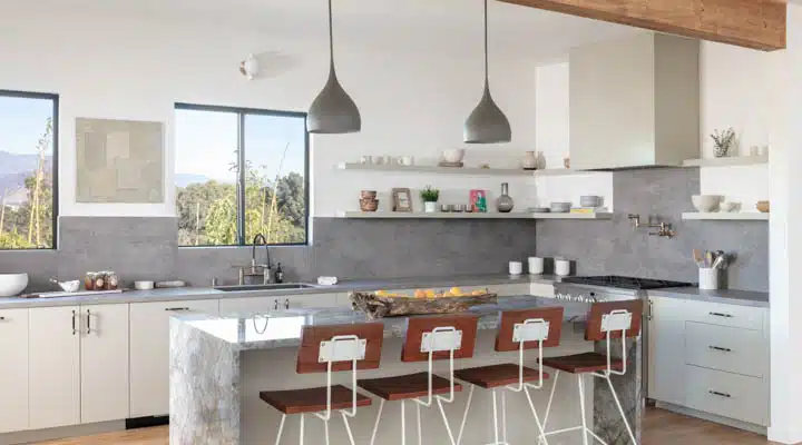 A kitchen with a sink and a window