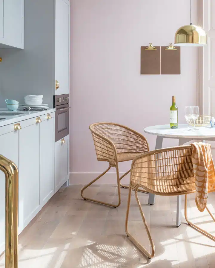 A kitchen with a dining room table