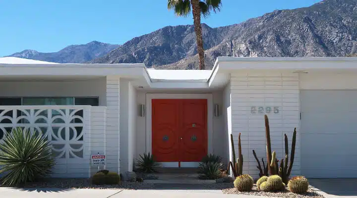 A house with a mountain in the background