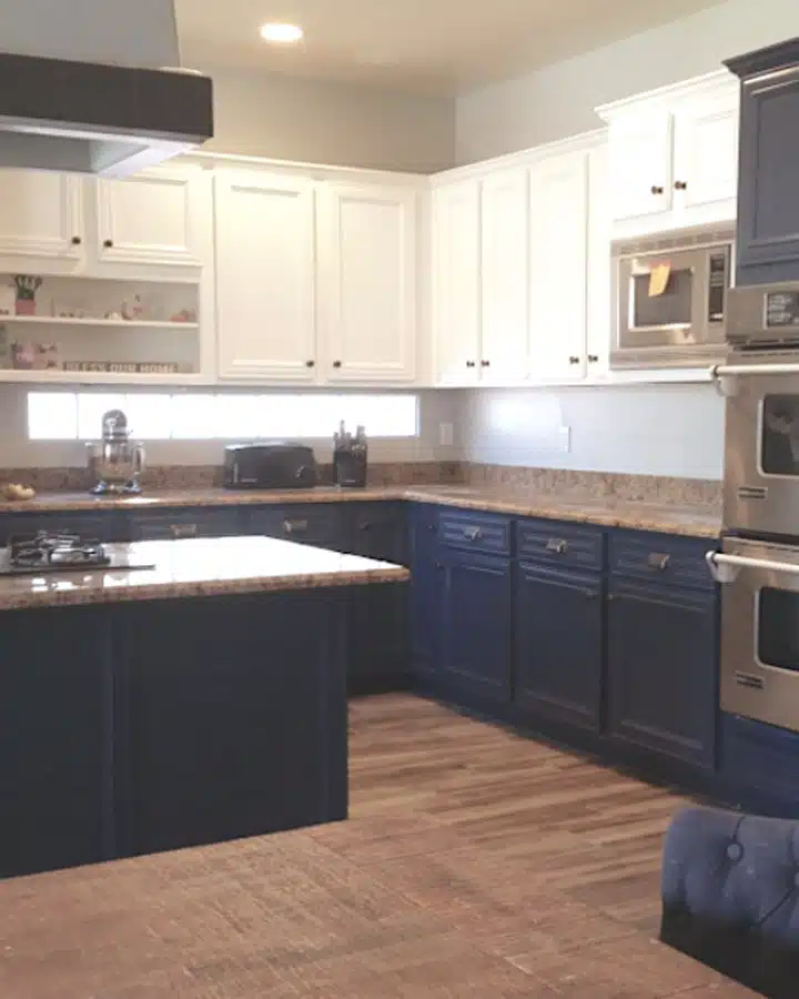 A modern kitchen with stainless steel appliances and wooden cabinets