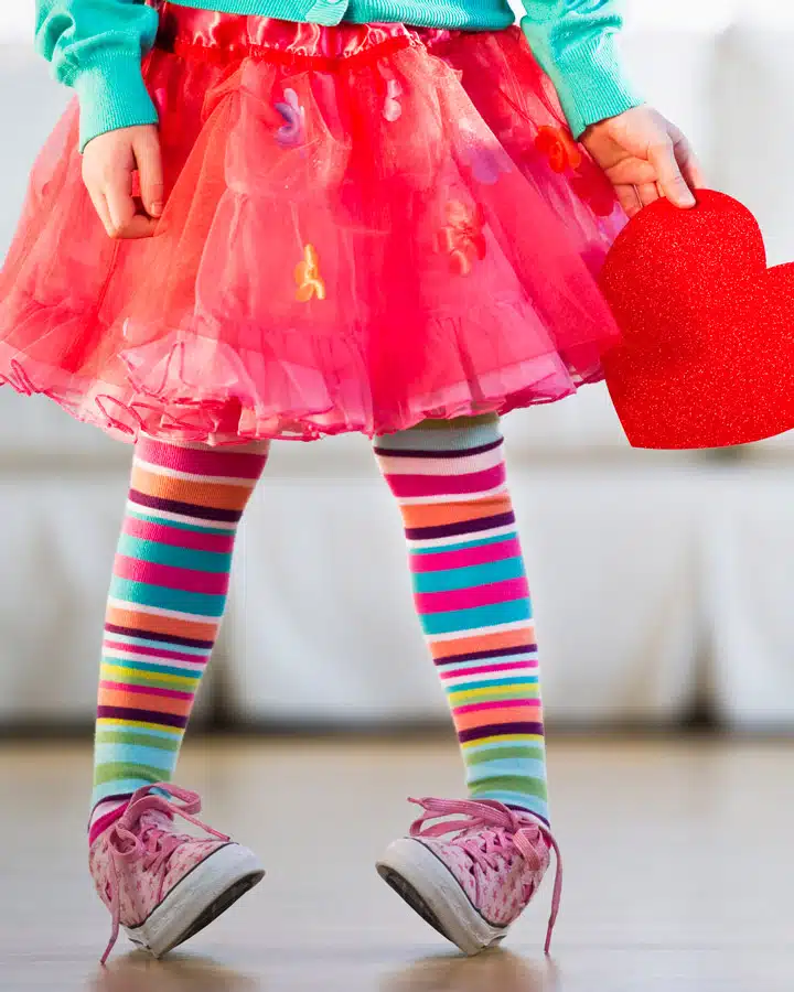 A little girl wearing a hat