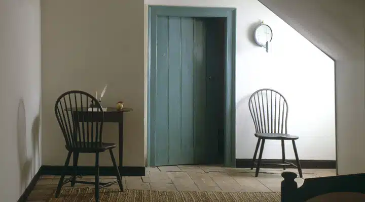 A dining room table in front of a window