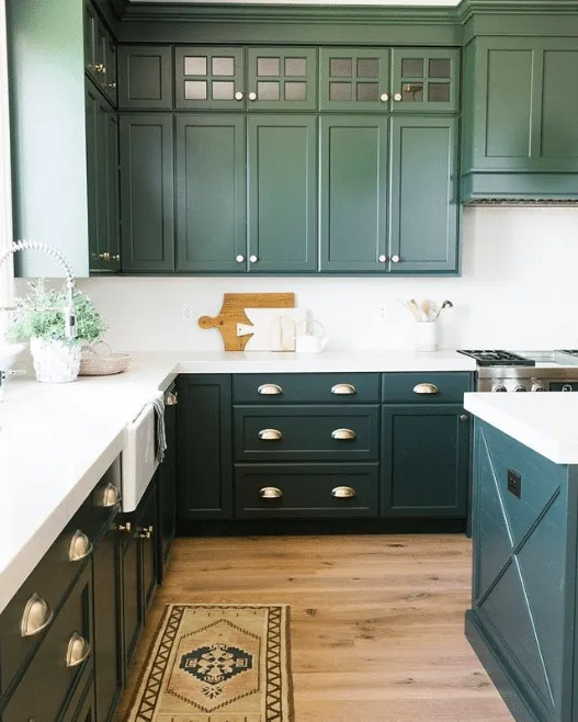 A kitchen with a stove and a sink