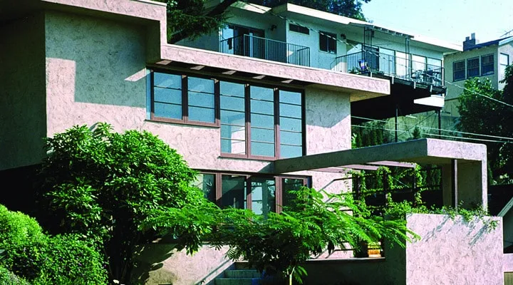 A house with trees in the background