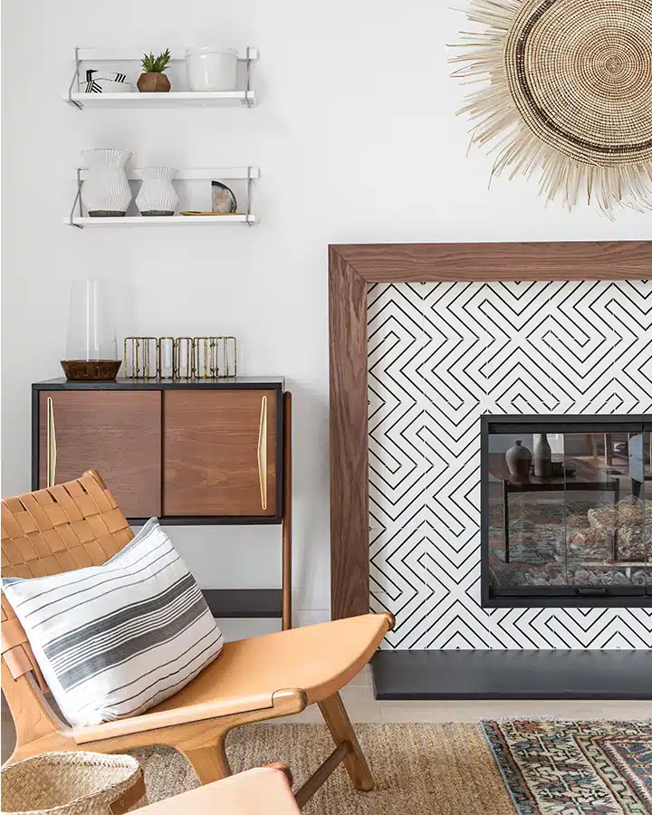 A living room filled with furniture and a fire place