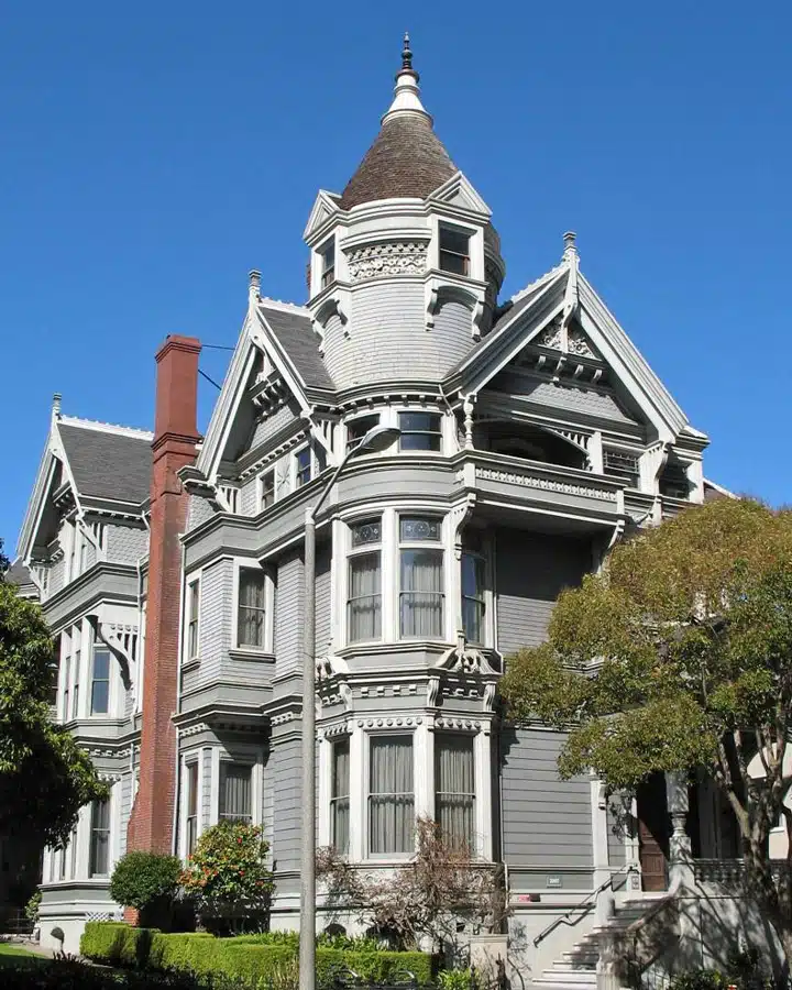 A large stone statue in front of Haas-Lilienthal House