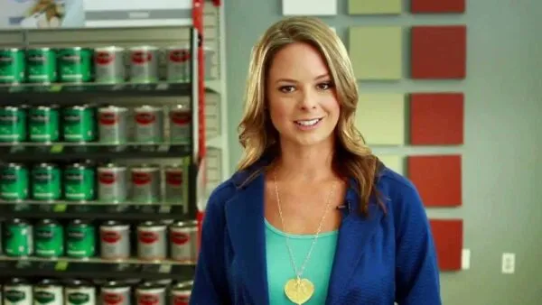 A woman standing in front of a can