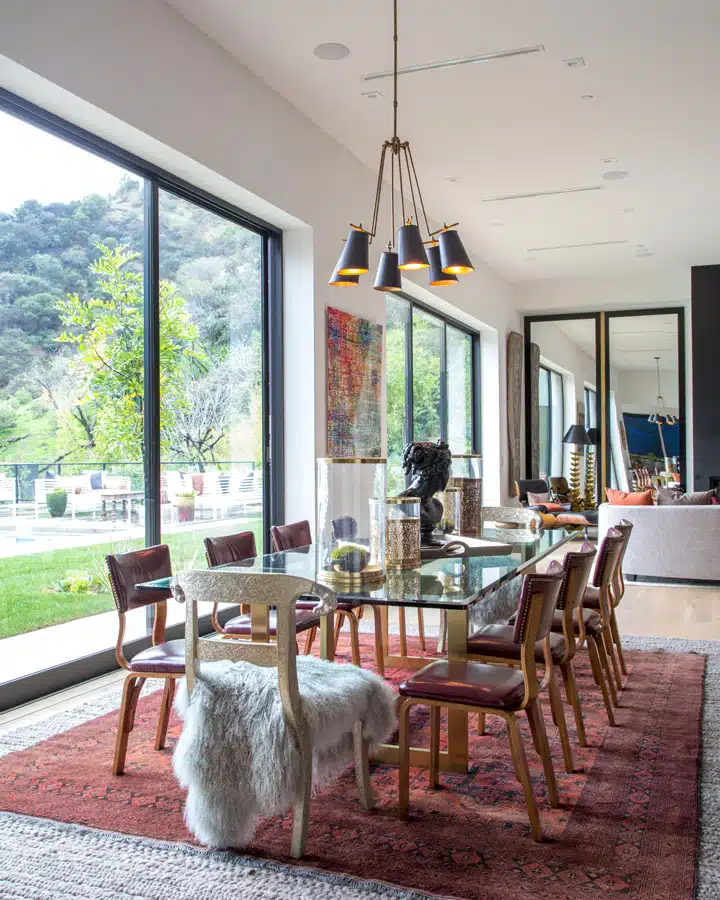 A living room filled with furniture and a large window