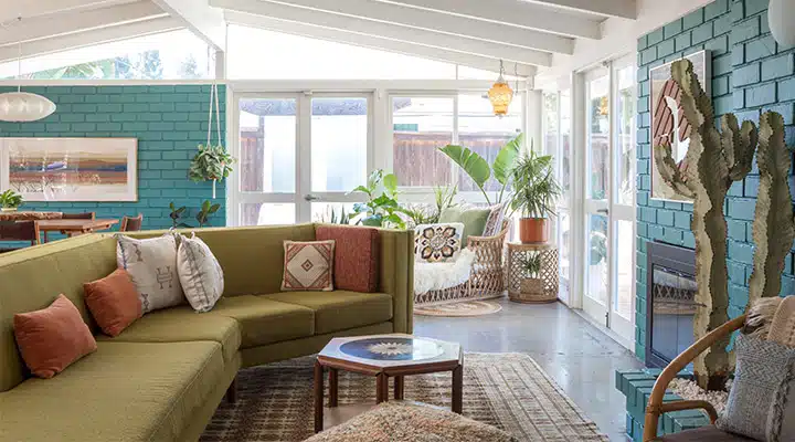 A living room filled with furniture and a large window