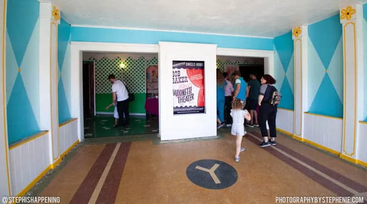 A group of people standing in a room