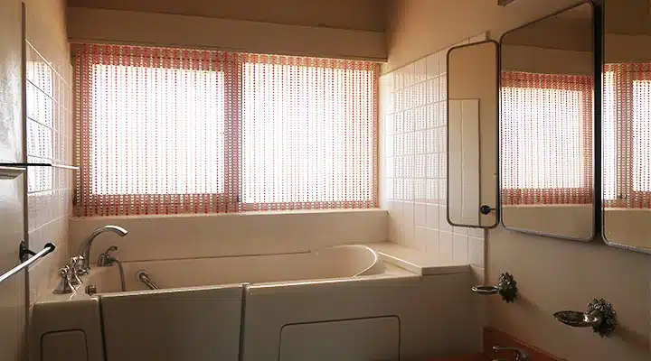 A room with a sink and a window