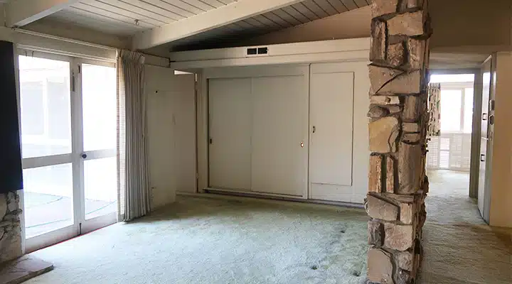 A kitchen with a wooden floor