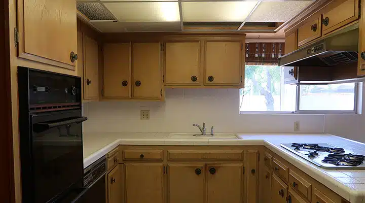 A kitchen with a stove top oven