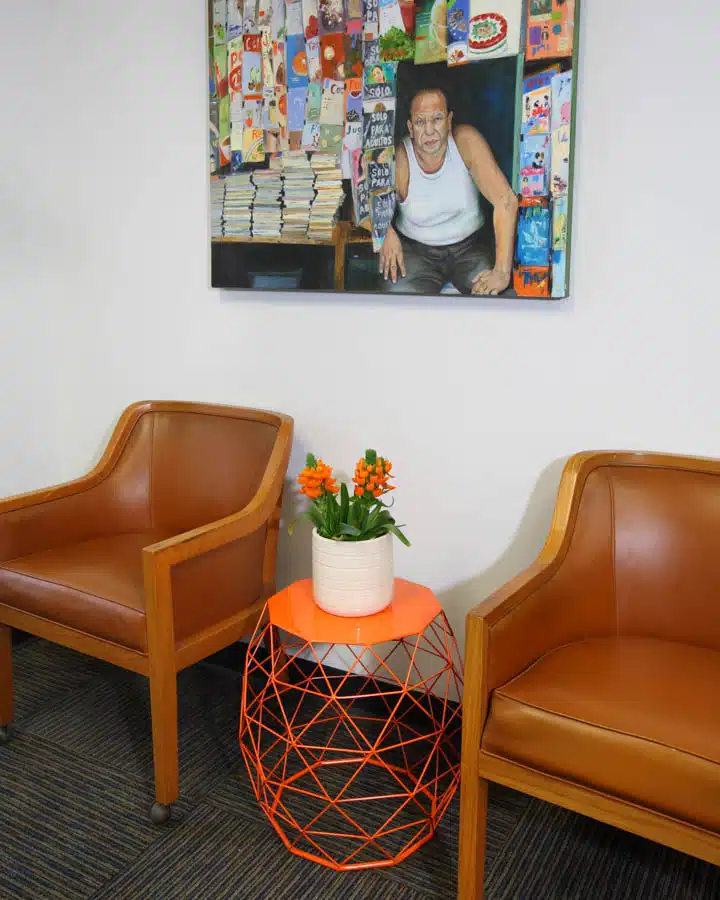 An orange chair in a room