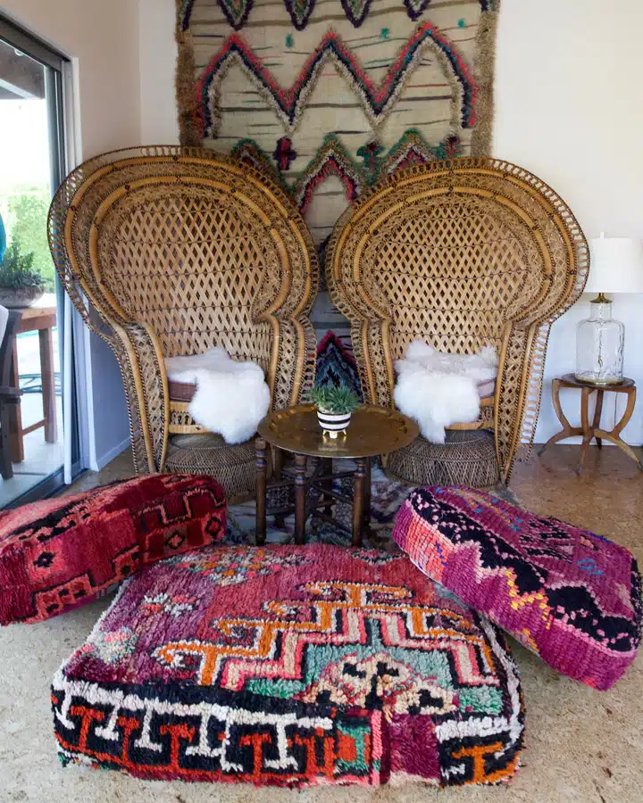 A colorful living room with a couch and a chair