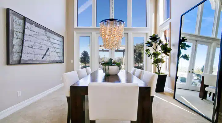 A living room filled with furniture and a large window