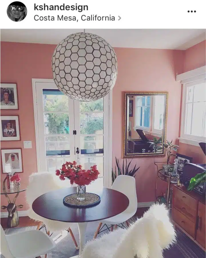 A living room filled with furniture and a large window