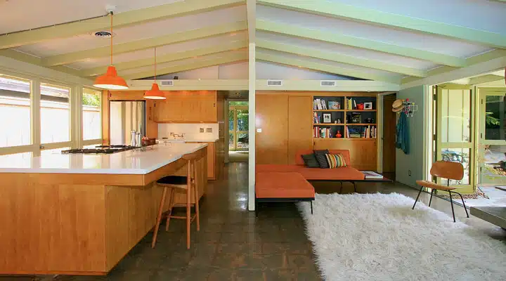 A kitchen with a wood floor
