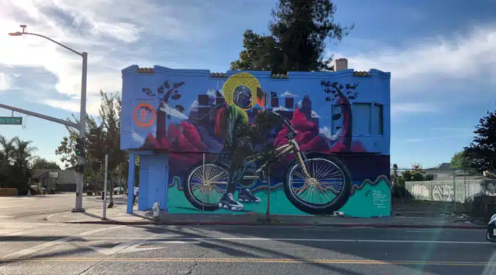 A bicycle parked on the side of a road