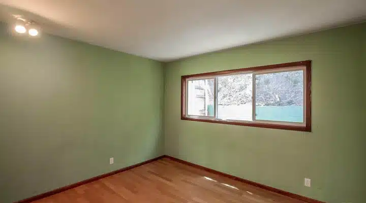 A room with a sink and a window