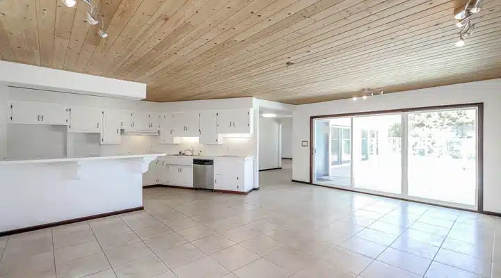 A kitchen with a wood floor