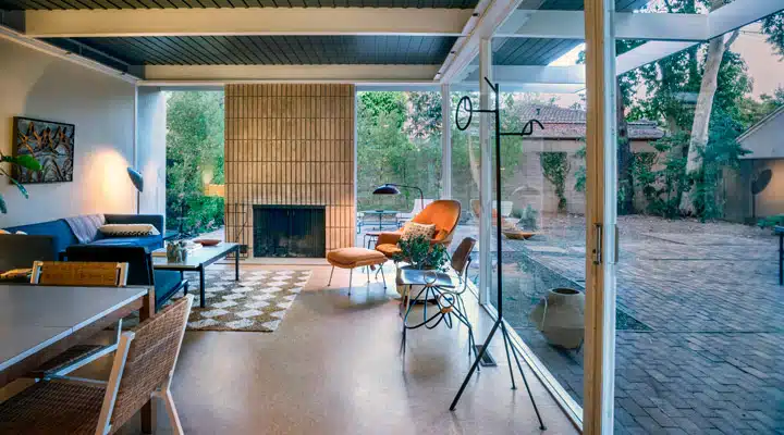 A dining room table in front of a window