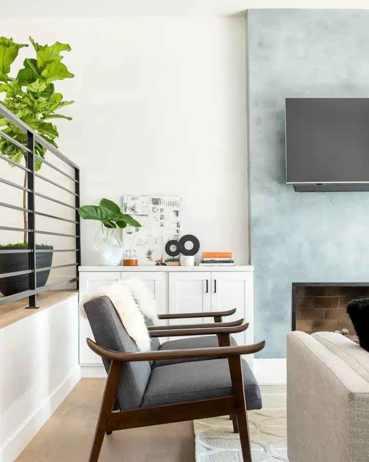 A kitchen with a table in a room