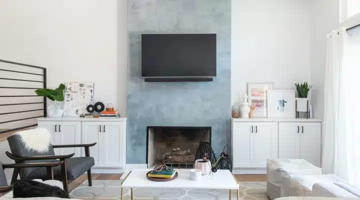 A living room filled with furniture and a fireplace