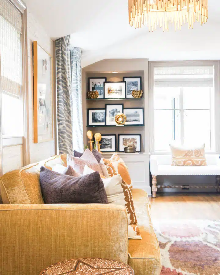 A living room filled with furniture and a fire place