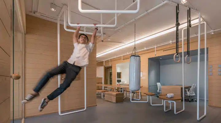 A person jumping in the air doing a trick on a skateboard