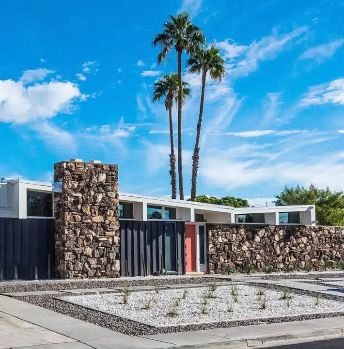 A building with palm trees