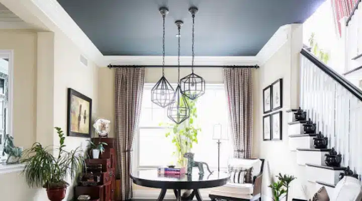 A living room filled with furniture and a large window