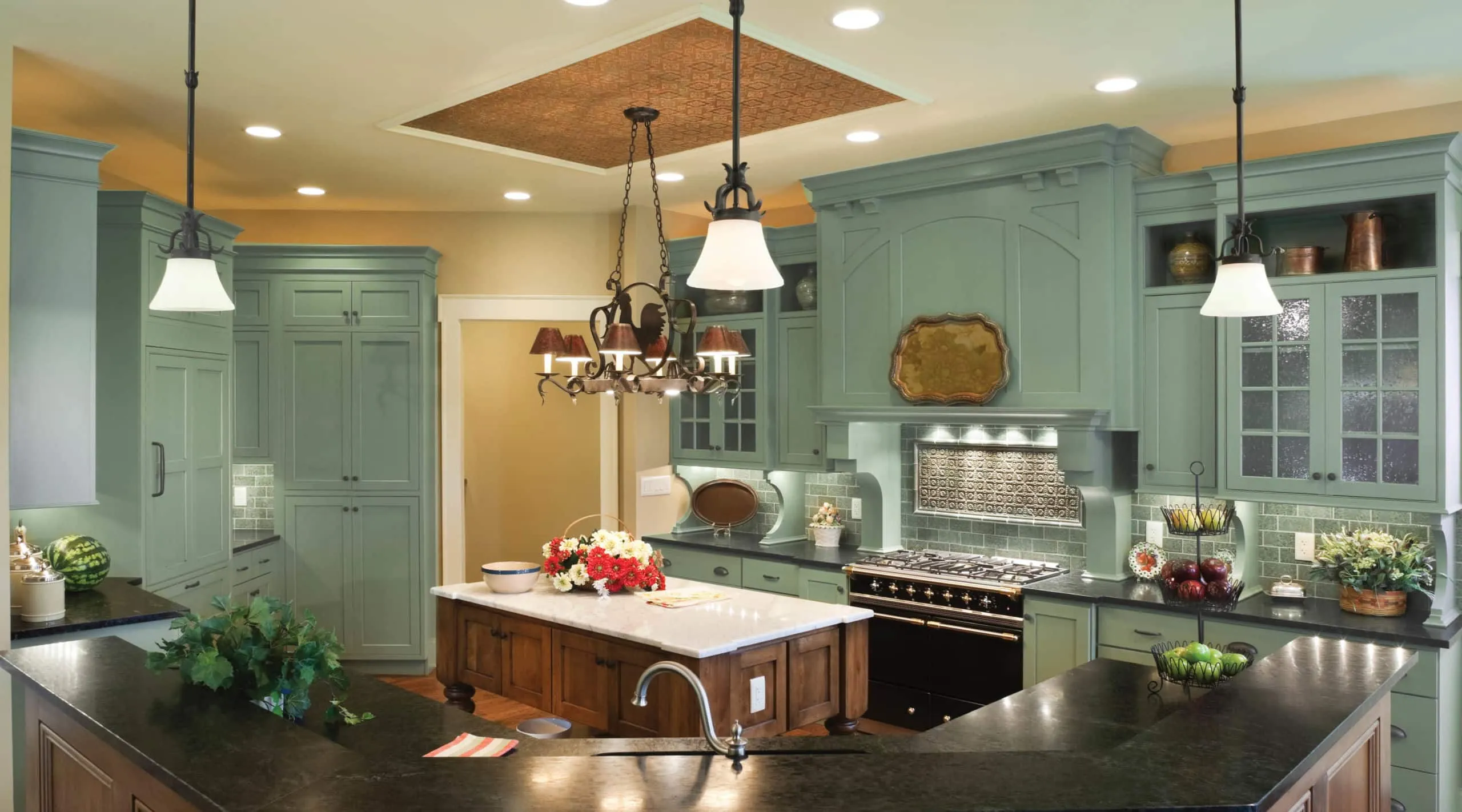 A kitchen with an island in the middle of a room