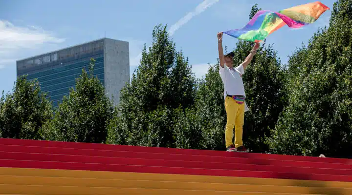 A young boy flying a kite