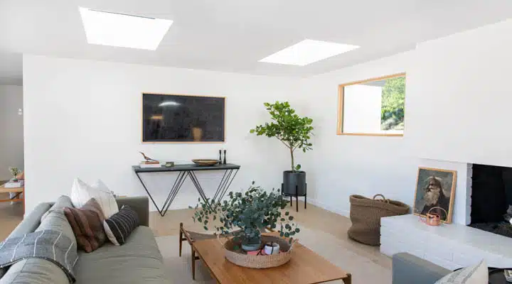 A living room filled with furniture and a fireplace