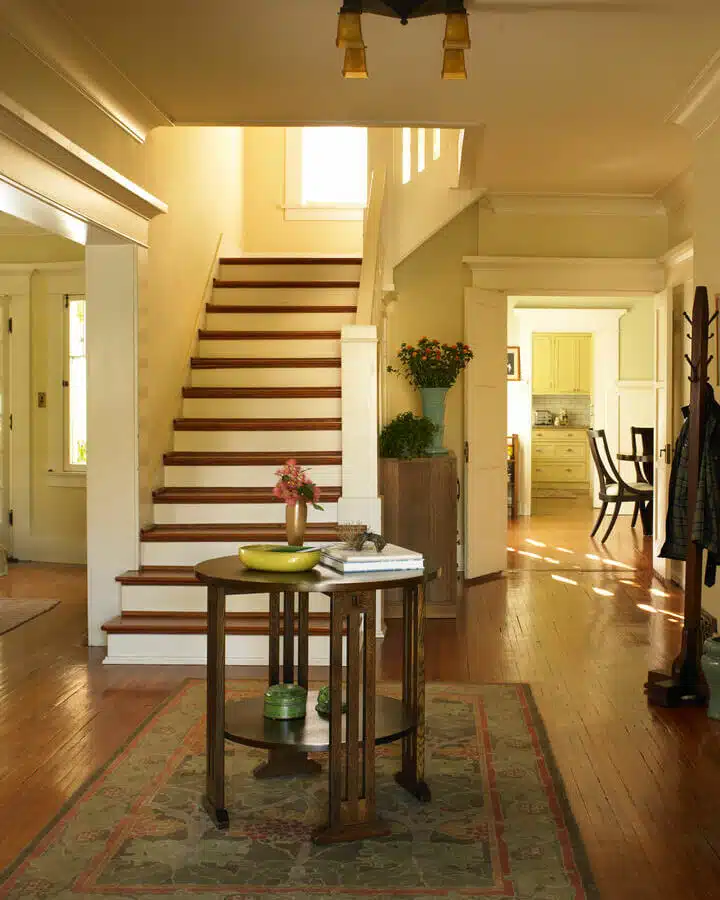 A living room filled with furniture and a wood floor