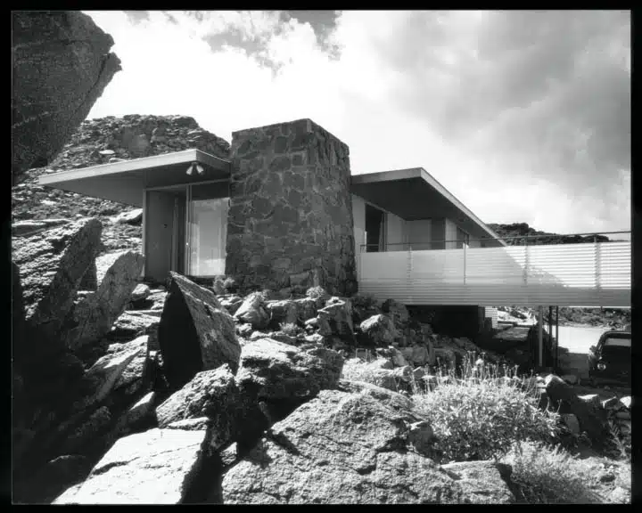 A house with a large rock