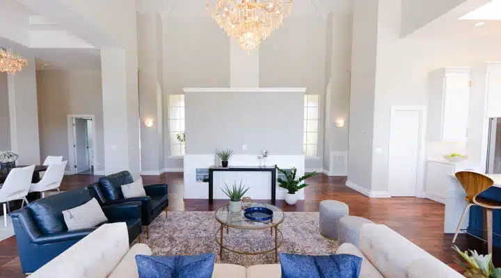 A living room filled with furniture and a fire place