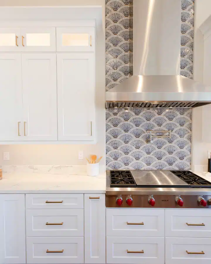 A stove top oven sitting inside of a kitchen