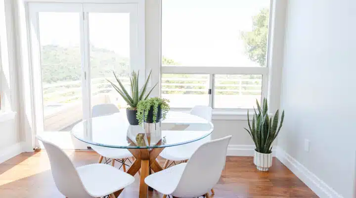 A living room filled with furniture and a large window